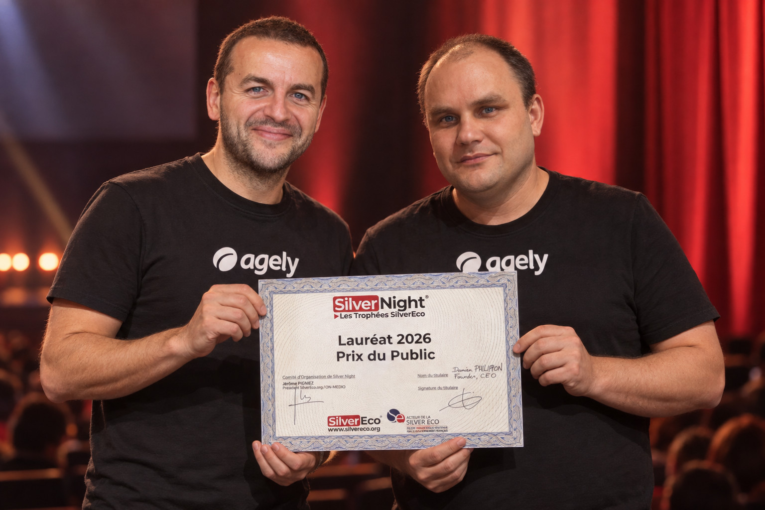 Damien Philippon and Fabien Vauchelles, co-founders of Agely, on stage holding the Audience Award (Prix du Public) diploma